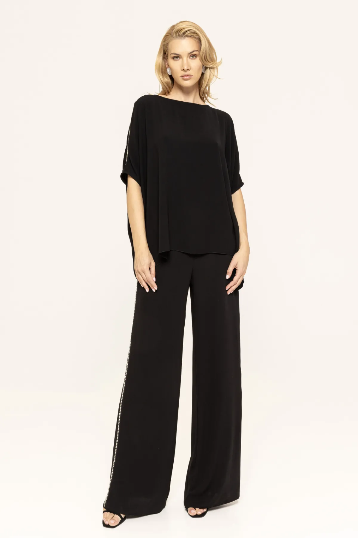 Shop Crystal detail palazzo pants Pants